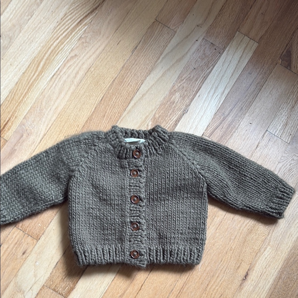 Cozy green baby cardigan